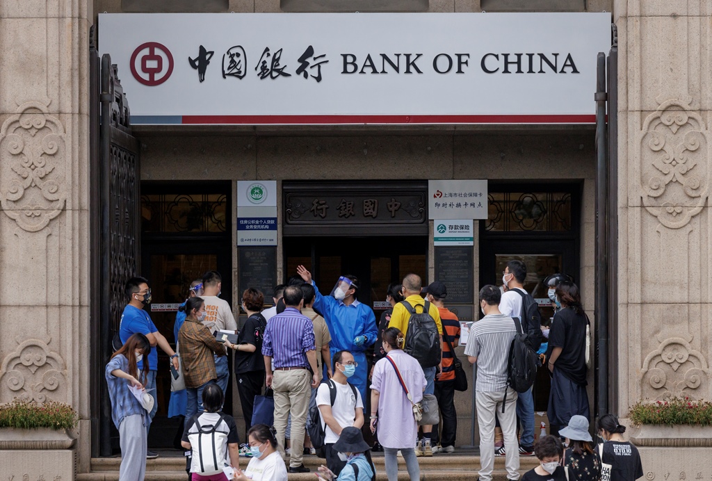 Bank of China © EPA/ALEX PLAVEVSKI