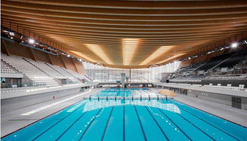 Το Ολυμπιακό Κέντρο Υγρού Στίβου στο Παρίσι με την αρχιτεκτονική που βασίζεται στο ξύλο © Ateliers 2/3/4/